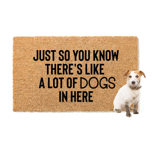 A Lot of Dogs in Here Doormat